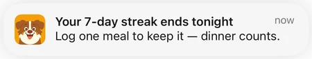 iOS notification from Carbo-AI. Your 7-day streak ends tonight. Log one meal to keep it — dinner counts.